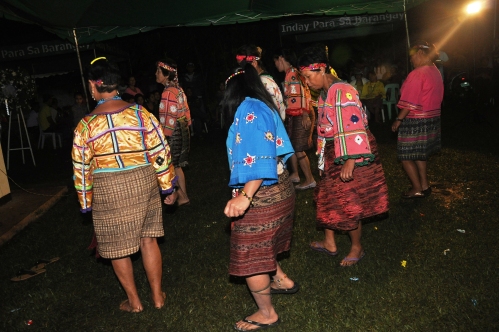 women folk dance to celebrate the deceased journey into the after life